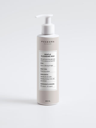Gentle Cleansing Milk bottle with pump dispenser for nourishing and makeup-removing skincare.