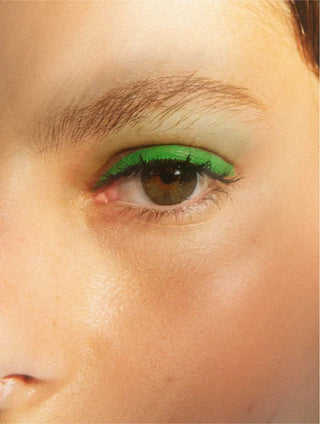 Close-up of an eye showcasing smooth skin, illustrating the effects of Brightening Eye Cream.